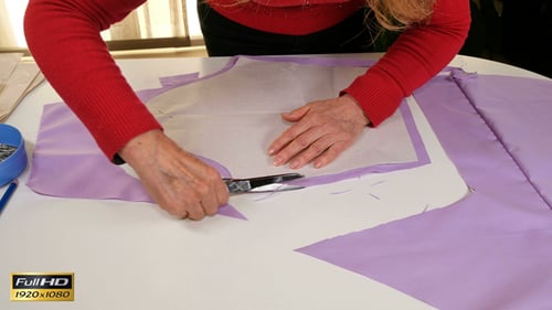 Adult Cutting Fabric with Scissors and Pattern