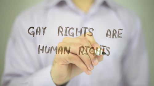 Hand Writing Gay Rights are Human Rights Message