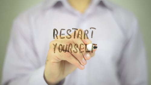 Restart Yourself Message Written on Glass