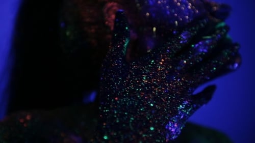Girl In The Ultraviolet Glow With Face Make-up Wipes