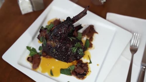 Close-up of leg of lamb with sauce