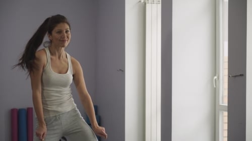 Happy Young Woman Dancing In Gym