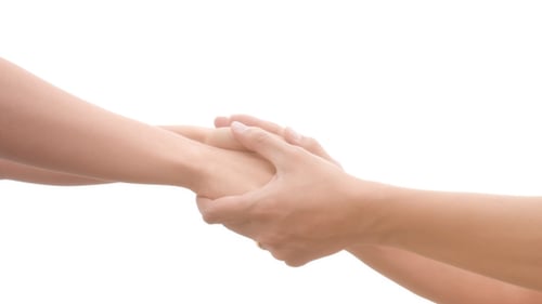 Hands Holding Tight on White Background