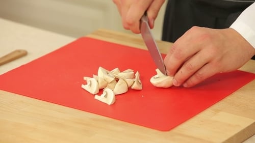 Chef Is Cutting Champignons