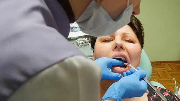 Young Woman With Dentist Pulling Tooth, Medical Stock Footage ft ...