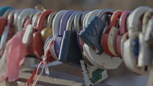 Padlock On The Bridge Of a Loving Couple