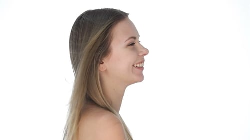Smiling Woman with Flowing Hair on White Background