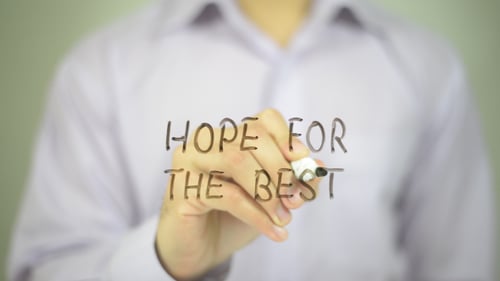 Hand Writing "Hope for the Best" on Glass