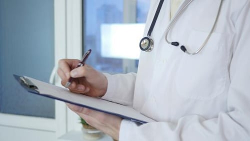 Doctor Prescribing Medication Or Drug