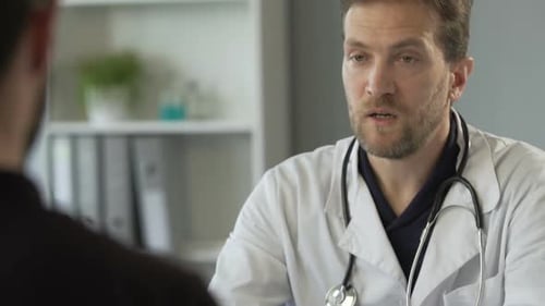 Doctor Prepares Stethoscope for Patient Consultation