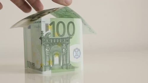 Finishing house made of European paper currency 4K 2160p 30fps UltraHD footage - Close-up real est