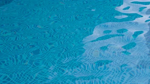 Outdoor Swimming Pool Water. Tropical Beach. Summer Vacation. Background, Sunlight.