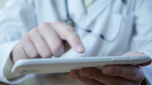 Doctor Using Tablet Pc In Hospital