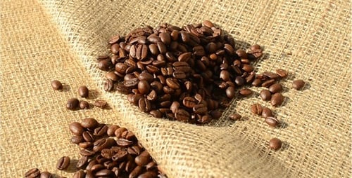 Roasted Coffee Beans Piled on Burlap Sack