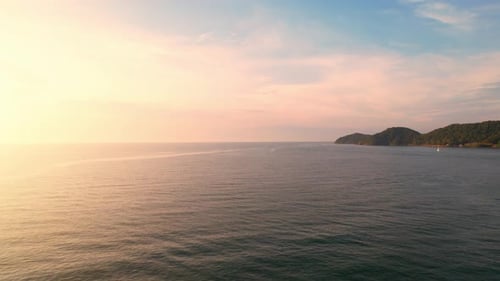 4K Aerial view of drone move on beautiful sea. sunset over ocean waves.