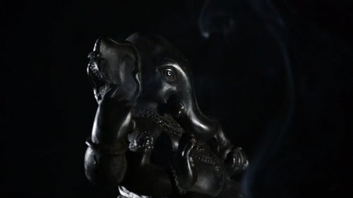 Detailed Ganesha Statue with Smoke in Dark Setting