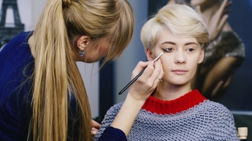 Cute Girl Doing Makeup In The Salon