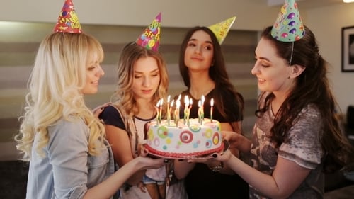 Happy Young Women Celebrating Birthday Together