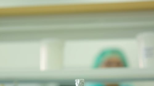 Erlenmeyer Flask Filled With Liquid in Laboratory