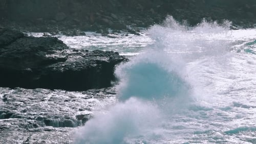 Ocean Waves Breaking On Rock