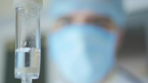 IV Drip Chamber in Hospital with Doctor