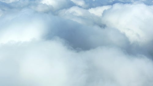 White Clouds Drifting in a Calm Sky