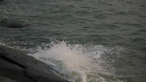Sea Wave Splashing Stone