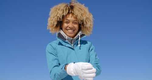 Cute Woman In Frizzy Hair And Winter Coat