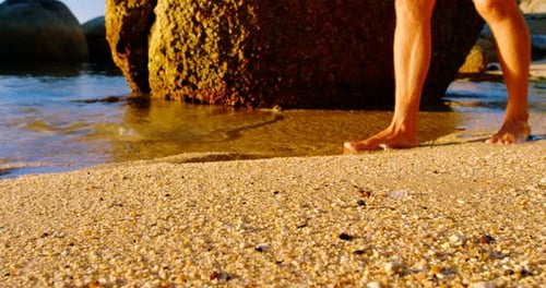 Man walking on the beach 4k