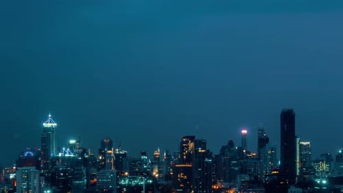 Time Lapse Night Cityscape and Highrise Buildings in Metropolis City Center