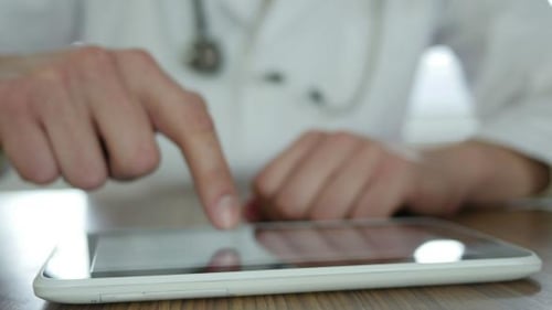 Typing Sms On Tablet In Hospital