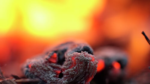 Burning Charcoal Embers in a Close-Up Macro Shot