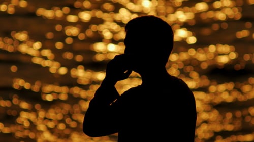 Silhouette Man Talking On Phone