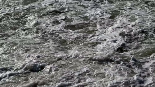 Waves Rolling On The Beach On a Stormy Day