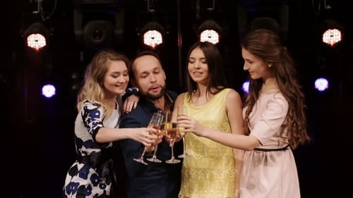 Group of Friends Toasting Champagne on Stage