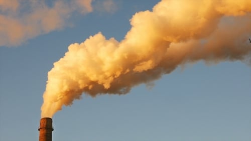 Factory Plant Smoke Stack Over Blue Sky Background