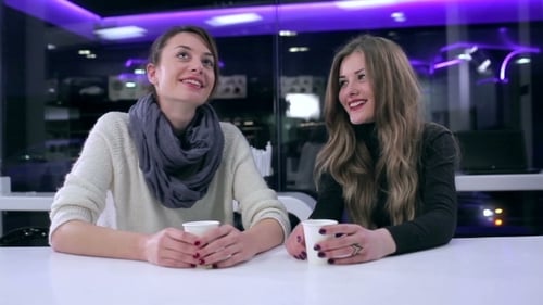 Girls Talking In Cafe