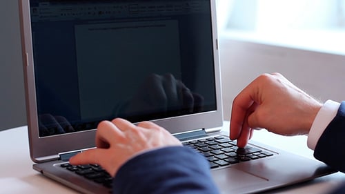Man Working On Laptop