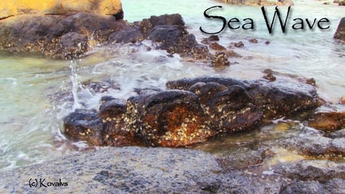 Surf On The Sea Shore Stones