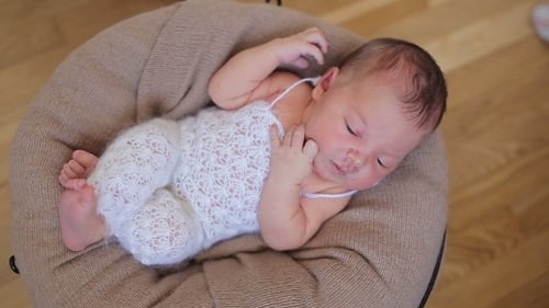 Sweet Newborn Baby Napping Peacefully Indoors