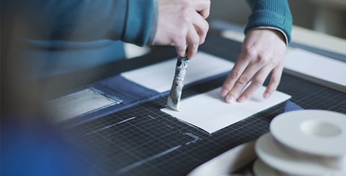 Applying Glue to Paper for Crafting Project