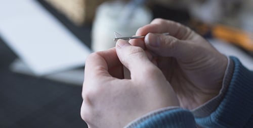Book Binding Process at Work Table Indoors