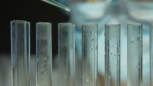 Liquid Being Piped into a Test Tube