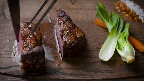 Slicing Roasted Beef Tenderloin with Vegetables