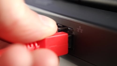 Ethernet Cable Plugs Into Electronic Device