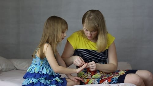 Mom Puts Star Stickers on Daughters Nails