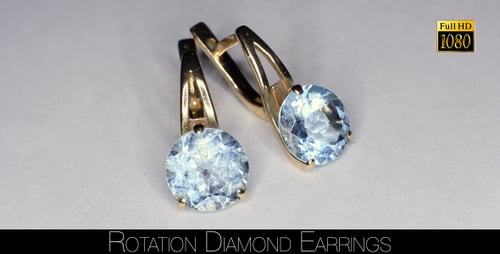 Elegant Gold Earrings with Light Blue Gemstones