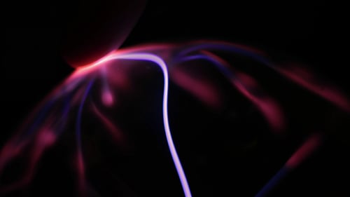 Glowing Plasma Filaments on Black Background