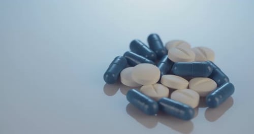 Pile of blue and white medicine close up