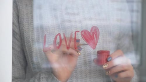 Writing Love Heart on Steamy Window with Red Paint